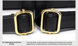 Detail of adjustable golden metal buckles on black lychee grain leather backpack straps