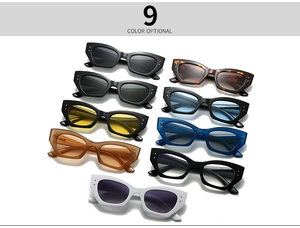 Vue à plat de petites lunettes de soleil œil de chat ovales en neuf coloris tendance