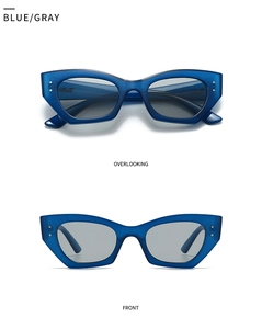 Vues de face et de dessus de lunettes de soleil bleues ovales aux verres gris fumé