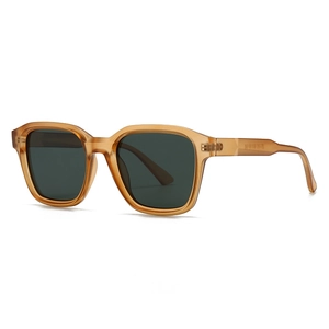 Modern retro square sunglasses with amber translucent frames and dark green lenses