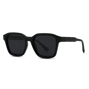 Modern retro square flat top sunglasses in matte black with dark grey lenses for street style