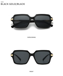 Dual view of black pilot sunglasses with gold metal accents and gray lenses on white