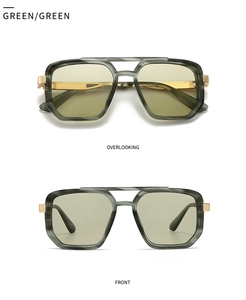 Detail view of green translucent square sunglasses with gold metal temples and green lenses