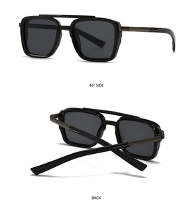 Detail view of vintage aviator sunglasses with black square frames and a double bridge design