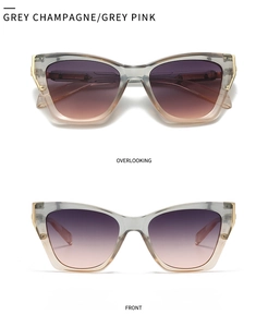 Detail of grey champagne gradient aviator sunglasses with gold metal hinges