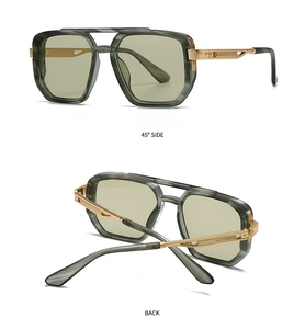 Detail of square sunglasses with grey marble texture and golden metal temples
