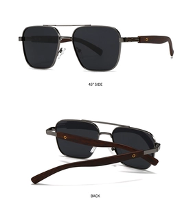 Detail view of square metal polarized sunglasses with textured wooden arms and 45 degree angle