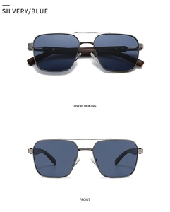 Detail view of silver square sunglasses with blue lenses and wood grain temples