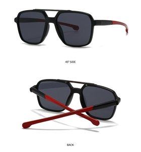 Detail view of square dual-beam sunglasses in black and red contrast showing side and back