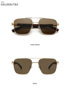Detail of pilot sunglasses with golden metal double bridge and dark wood grain temples