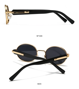 Detail view of round polarized sunglasses with black lenses and gold metal frames