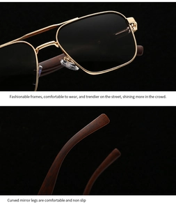 Detail of square gold metal frame sunglasses with dark lenses and wood texture temples