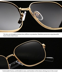 Détail de lunettes de soleil en métal doré avec plaquettes de nez en silicone