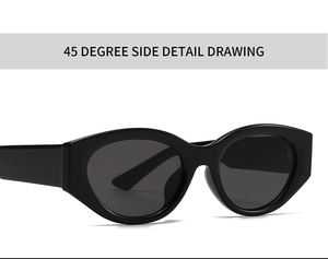 45 degree side detail of black thick frame cat eye sunglasses with dark lenses