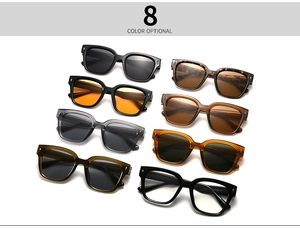 Flat lay of vintage square sunglasses in eight colors including tortoiseshell and amber