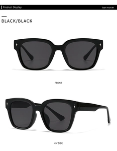 Macro detail of square retro sunglasses with silver star rivets on black frame