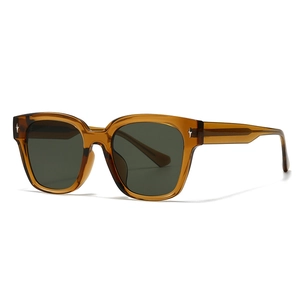 Retro amber square frame sunglasses with dark green lenses and silver star accents