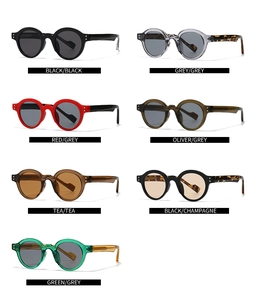 Collage of vintage round frame sunglasses in seven assorted colors with metal rivets