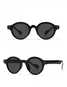 Front and side view of black round frame sunglasses with silver rivet decorations