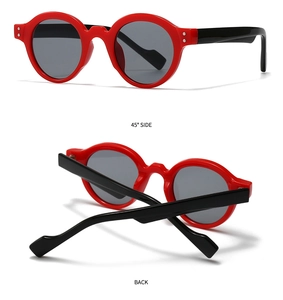 Detail view of retro round sunglasses with red front frames and black temples from two angles