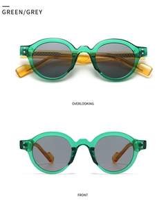 Front and top view of green retro round sunglasses with grey lenses and clear temples