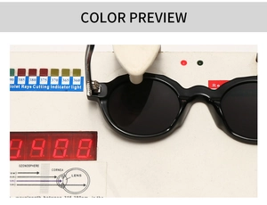 Close-up of retro black round sunglasses undergoing a professional UV protection test