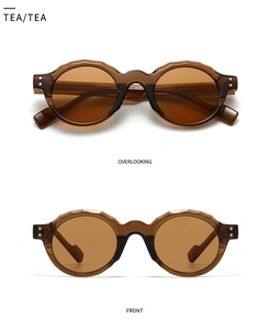 Detailed top and front view of amber round wave-edge sunglasses with silver rivets
