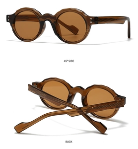 Detail view of round sunglasses with amber texture and wave pattern on temples