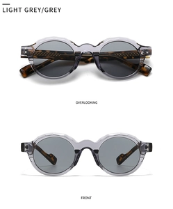 Close-up of retro sunglasses featuring light grey wavy frames and tortoiseshell temples