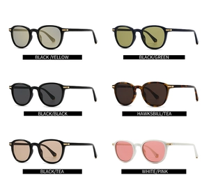 Matrix layout of vintage round sunglasses with multiple lens colors and gold hinges