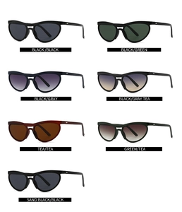 Collection of cat-eye sunglasses in various frame colors with gradient and solid lenses