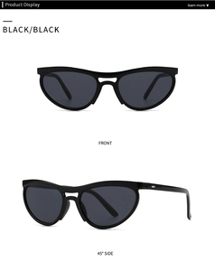 Close-up of black cat-eye sunglasses featuring elegant silver metal temple decorations