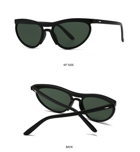 Detailed 45-degree side and back view of retro black cat-eye sunglasses with green lenses