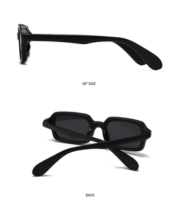 Detailsicht der schwarzen rechteckigen matten Sonnenbrille mit grauen Gläsern von der Seite