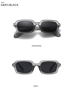 Vorder- und Draufsicht der quadratischen Vintage-Sonnenbrille in Transparentgrau mit Nieten