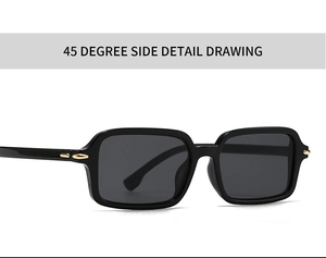 Close-up of black square sunglasses featuring elegant gold metal trim on the hinges