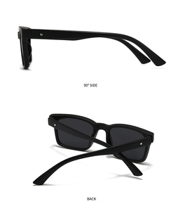 Detailansicht der schwarzen quadratischen Sonnenbrille mit silbernem Stern am Bügelgelenk