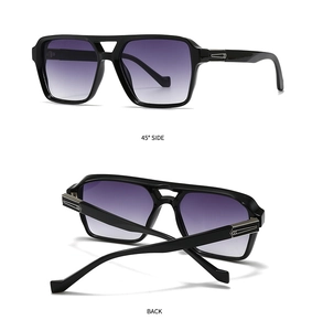 Detail view of square black sunglasses with silver hinge accents and gradient lenses