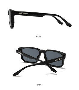 Detail view of black square sunglasses with silver arrow metal temple decorations