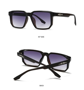 Detail view of square black sunglasses with purple gradient lenses and silver metal rivets