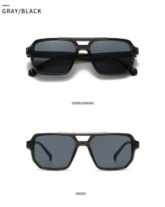 Detailed front and top view of gray square sunglasses with rivet accents and black lenses