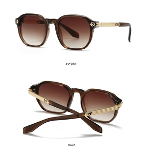 Detail view of tea brown retro sunglasses with gold metal temples and geometric engraving