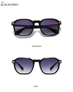 Front and top view of black round sunglasses with gold arrow metal hinge details