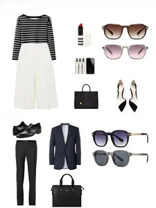 Flat lay of vintage round sunglasses with rivet detail for men and women lifestyle outfits