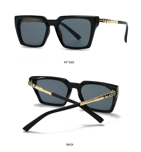 Detail view of black square sunglasses with gold metal accents on the temples