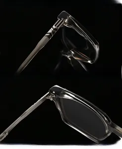 Detail showing high-quality metal hinge on transparent gray round sunglasses frame