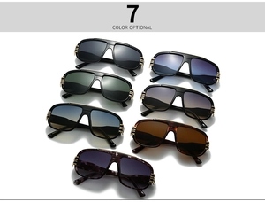Detailed view of seven oversized aviator sunglasses in various colors and golden accents