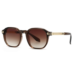Retro round tortoiseshell sunglasses with brown gradient lenses and gold metallic temples