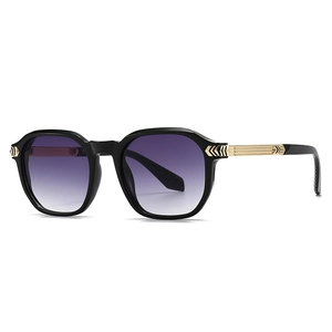 Fashionable round sunglasses with black frames, purple gradient lenses and gold temples