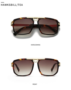 Modern hawksbill aviator sunglasses with tea gradient lenses and gold metal accents